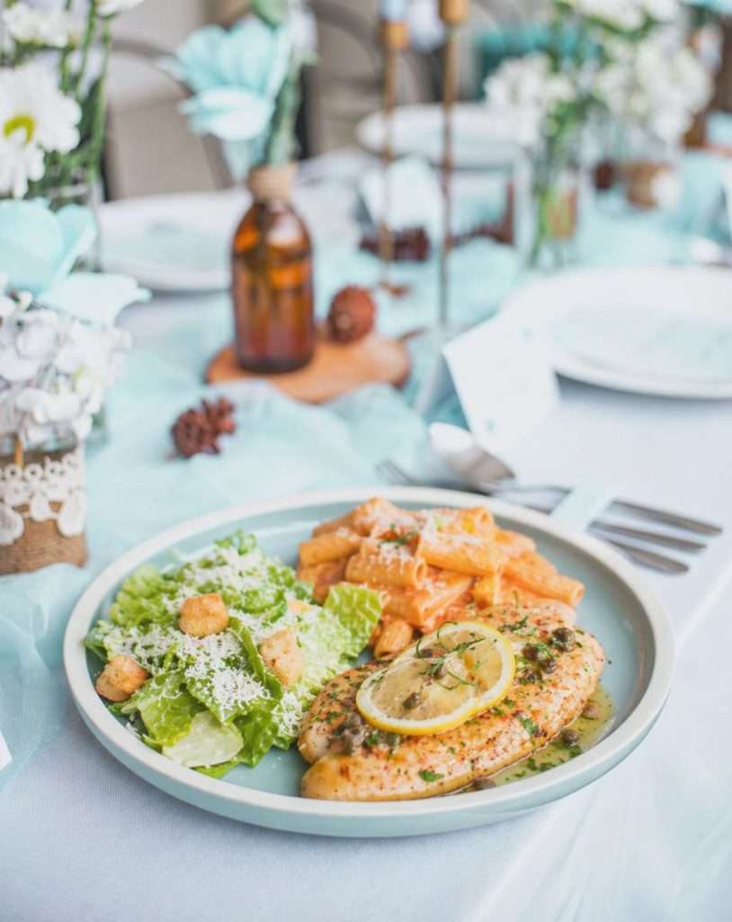Plated meal with chicken and pasta