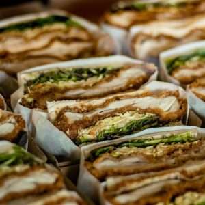 a close up of a tray of sandwiches